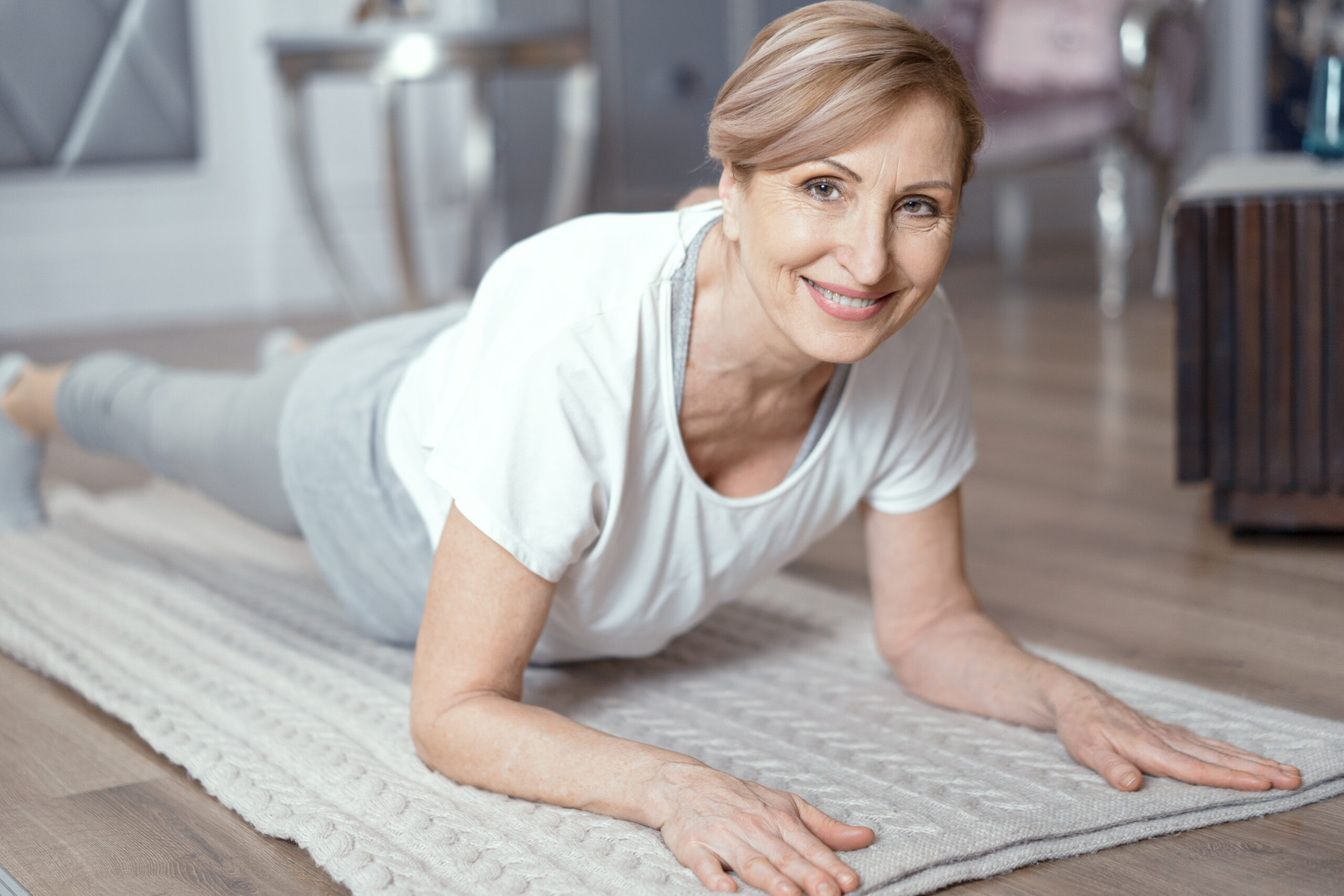 Woman with strong core doing a forearm plank