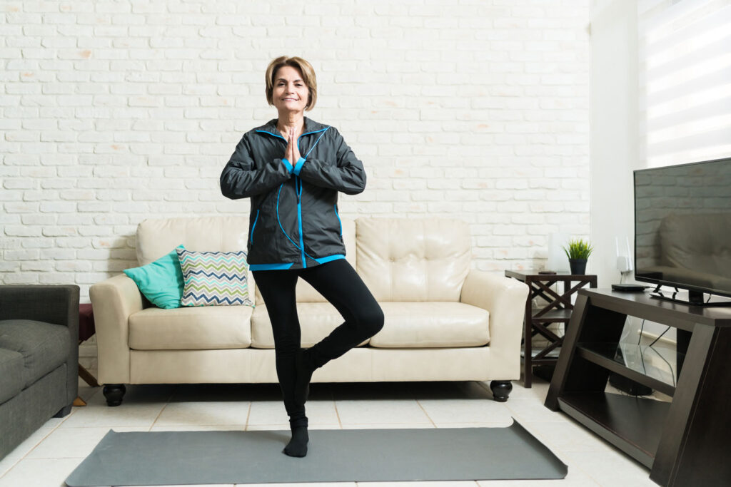 Active Elderly Woman Doing Balance Practice